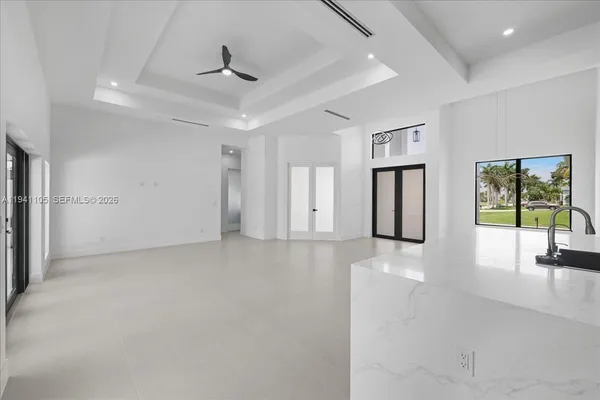 a view of a livingroom with a staircase