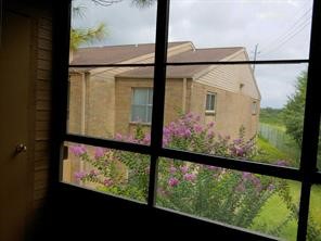 10555 Turtlewood Court, Unit 1511 Houston, TX 77072 - Photo 12 of 23 a view of a from a window