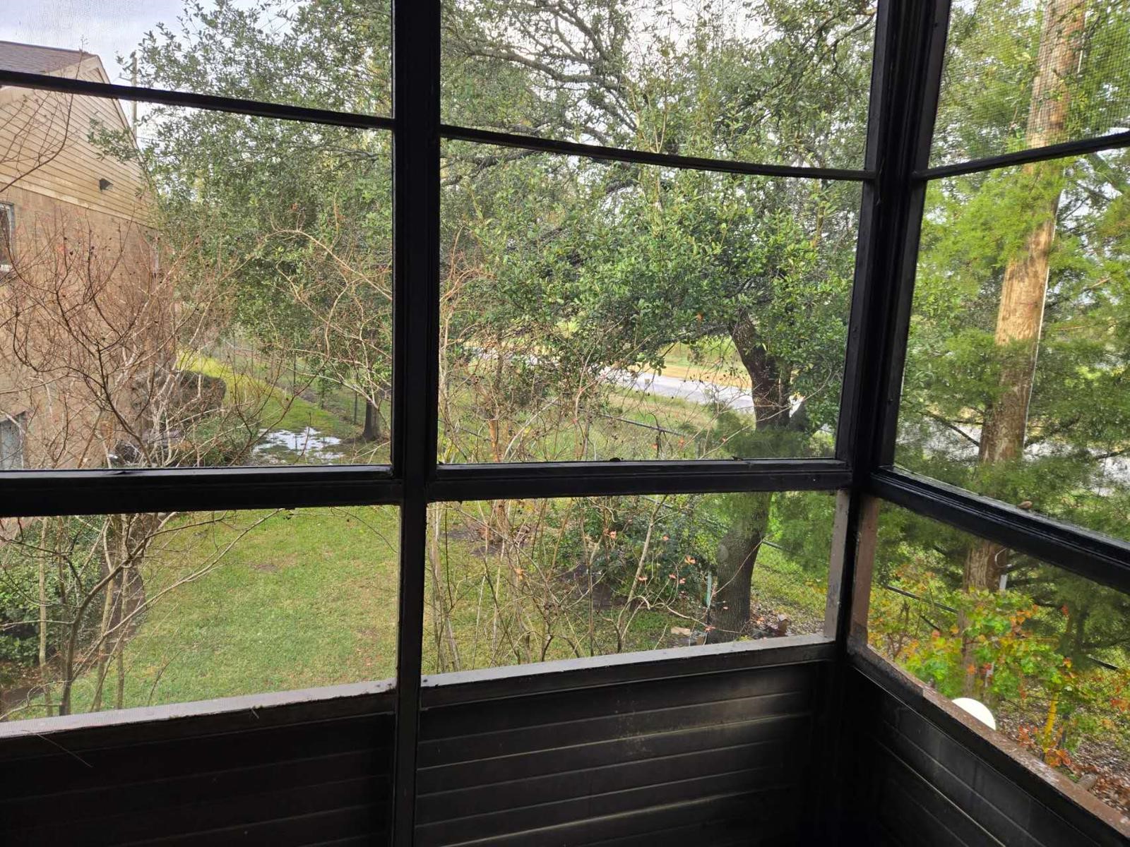 10555 Turtlewood Court, Unit 1511 Houston, TX 77072 - Photo 18 of 23 a view of outdoor with green space