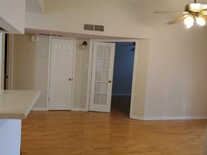 10555 Turtlewood Court, Unit 1511 Houston, TX 77072 - Photo 5 of 23 a view of an empty room