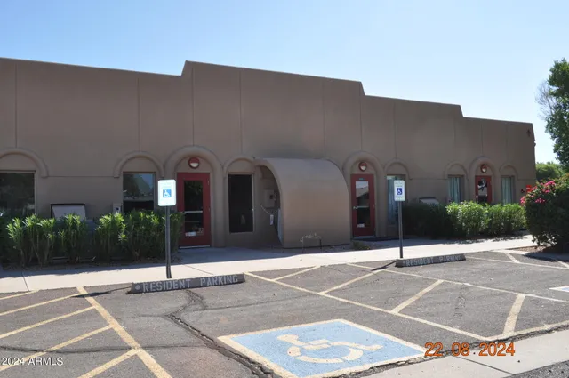 a view of a door with wooden floor
