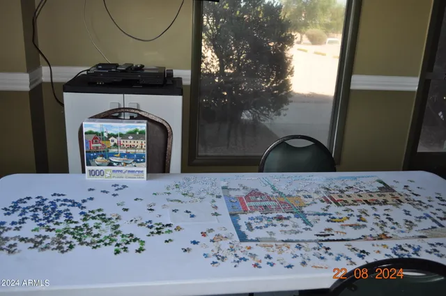 a view of a dining room with furniture