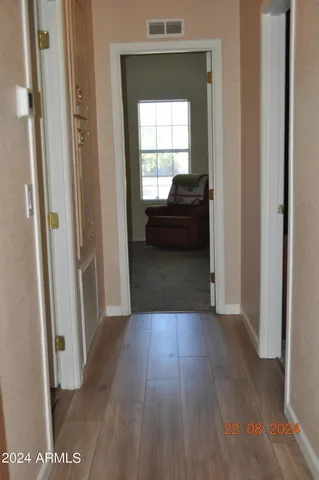 a bedroom with a bed and closet