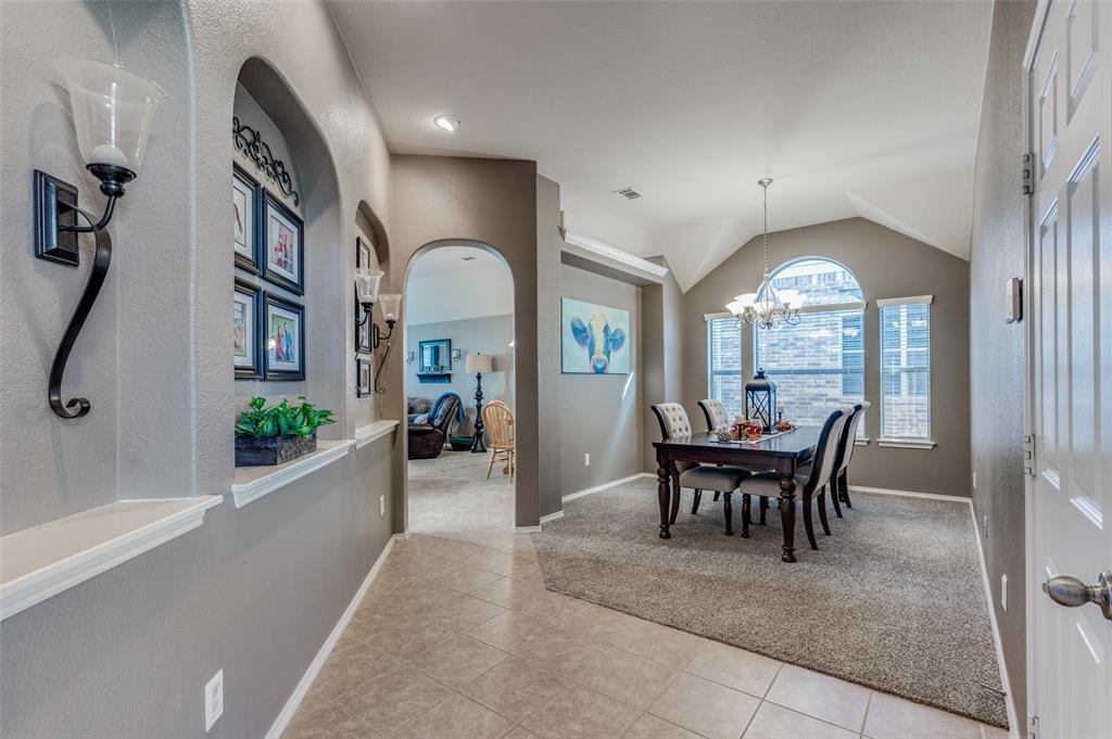 a view of a livingroom with furniture and front door