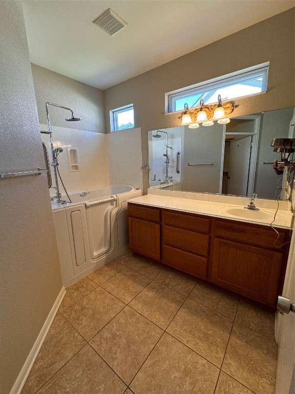 127 Verbena Drive Georgetown, TX 78633 - Photo 12 of 12 a room with a sink and a mirror