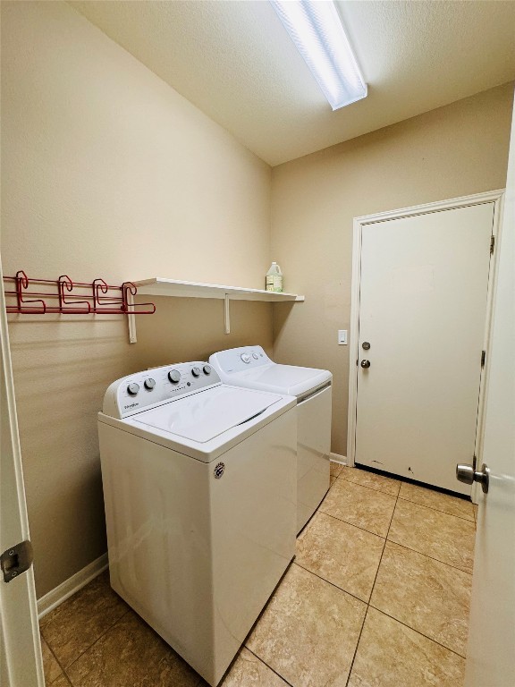 127 Verbena Drive Georgetown, TX 78633 - Photo 9 of 12 a utility room with dryer and washer