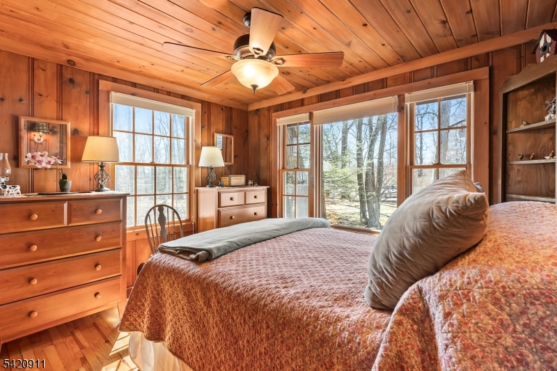 5 Anawa Road Vernon, NJ 07422 - Photo 20 of 44 a bed sitting in a bedroom next to a window