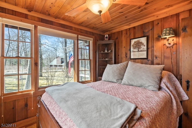 5 Anawa Road Vernon, NJ 07422 - Photo 21 of 44 a bed sitting in a bedroom next to a window