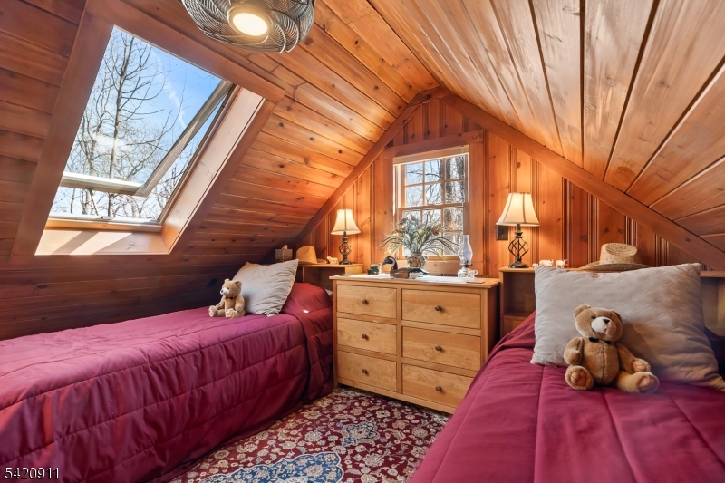 5 Anawa Road Vernon, NJ 07422 - Photo 27 of 44 a spacious bedroom with a bed and a window