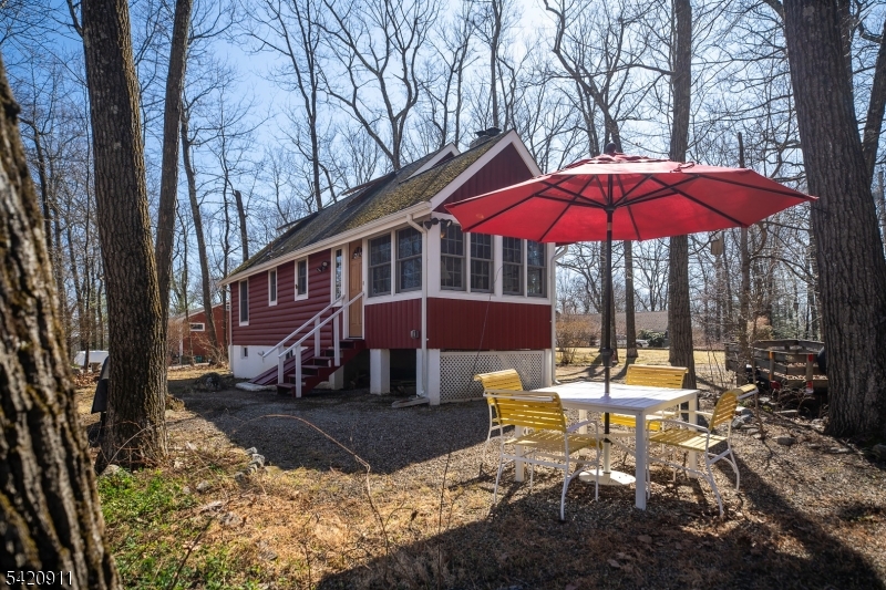 5 Anawa Road Vernon, NJ 07422 - Photo 30 of 44 a view of a house with backyard porch and sitting area
