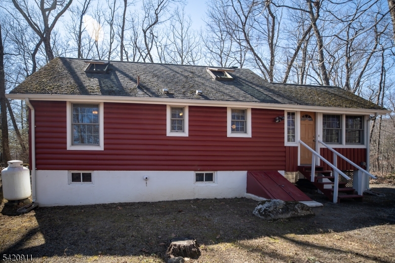 5 Anawa Road Vernon, NJ 07422 - Photo 32 of 44 a front view of a house with a yard