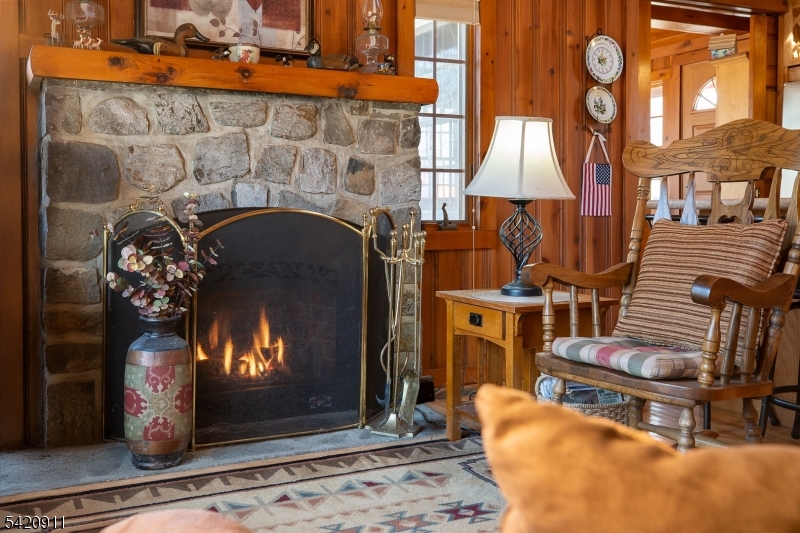 5 Anawa Road Vernon, NJ 07422 - Photo 8 of 44 a view of fireplace with wooden floor