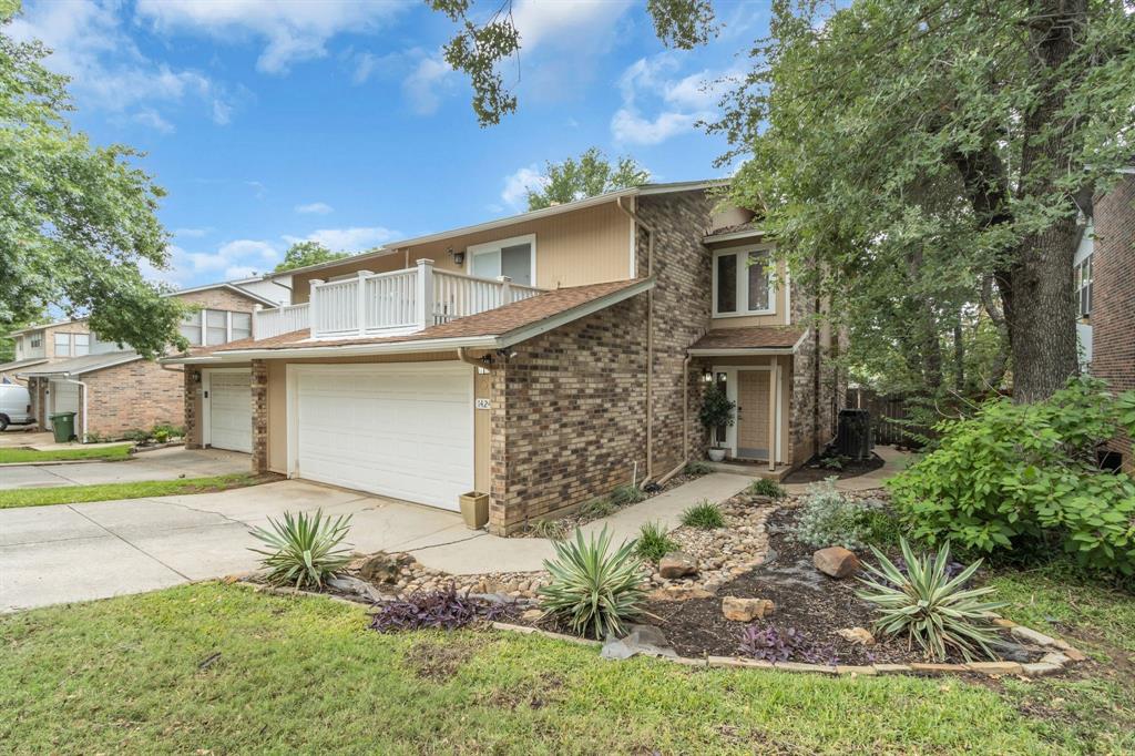 1424 Hampton Road Grapevine, TX 76051 - Photo 1 of 1 a front view of a house with garden