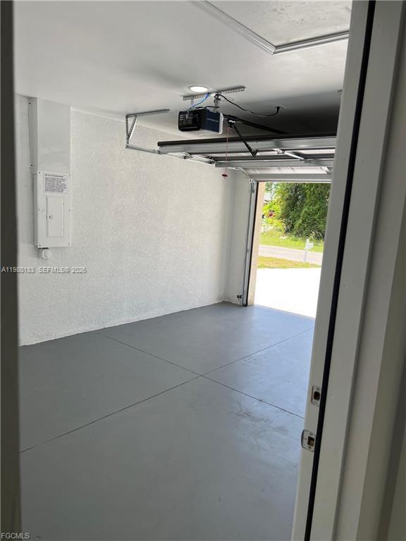 4854 30th Street Southwest, Unit 4854 Lehigh Acres, FL 33973 - Photo 10 of 11 a view of storage and utility room with washer and dryer