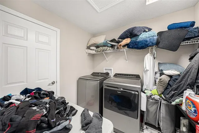 a room with a storage and utility