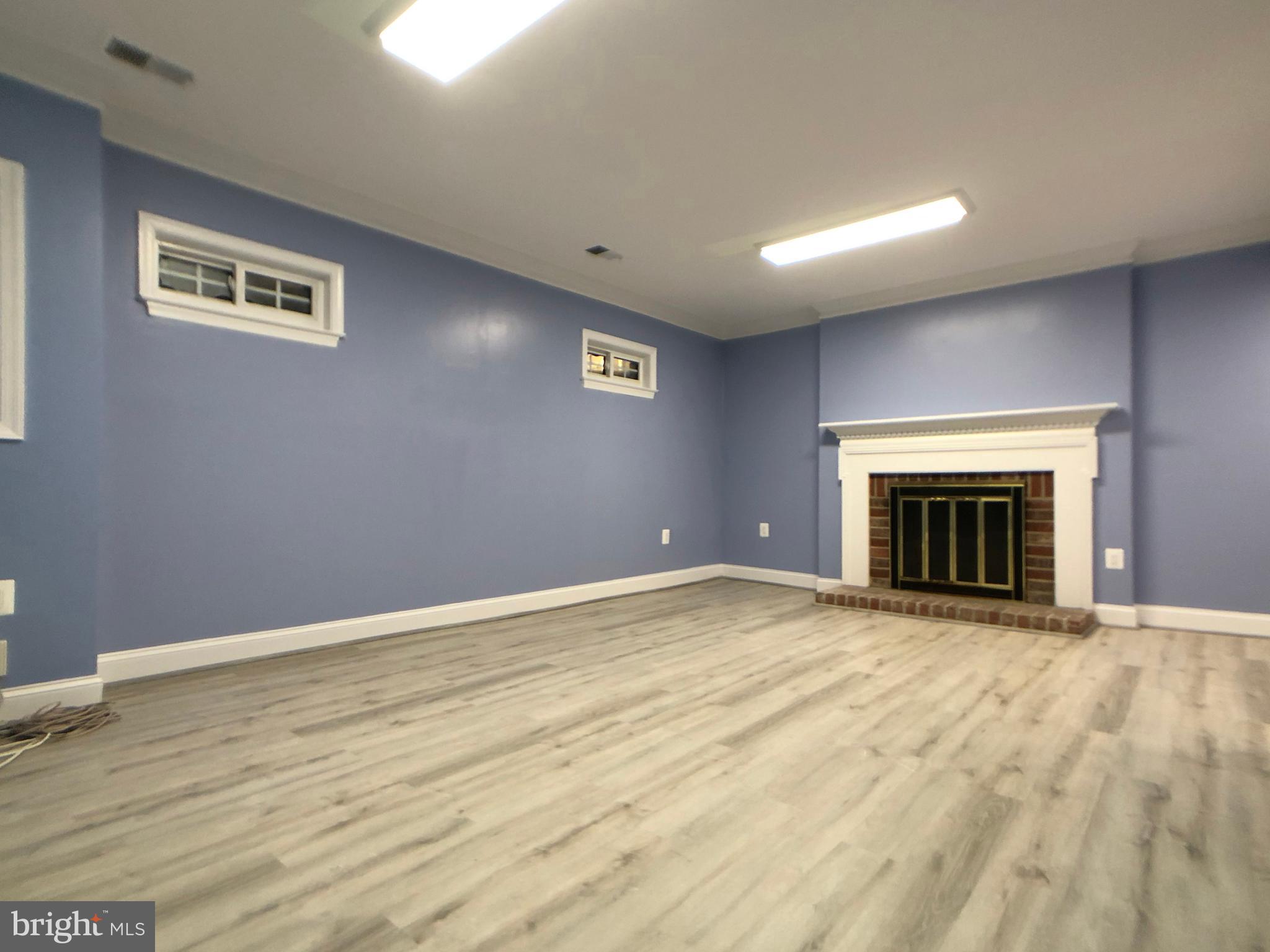 3801 Tremayne Terrace, Unit 20 Silver Spring, MD 20906 - Photo 32 of 35 Family Room with Second Fireplace