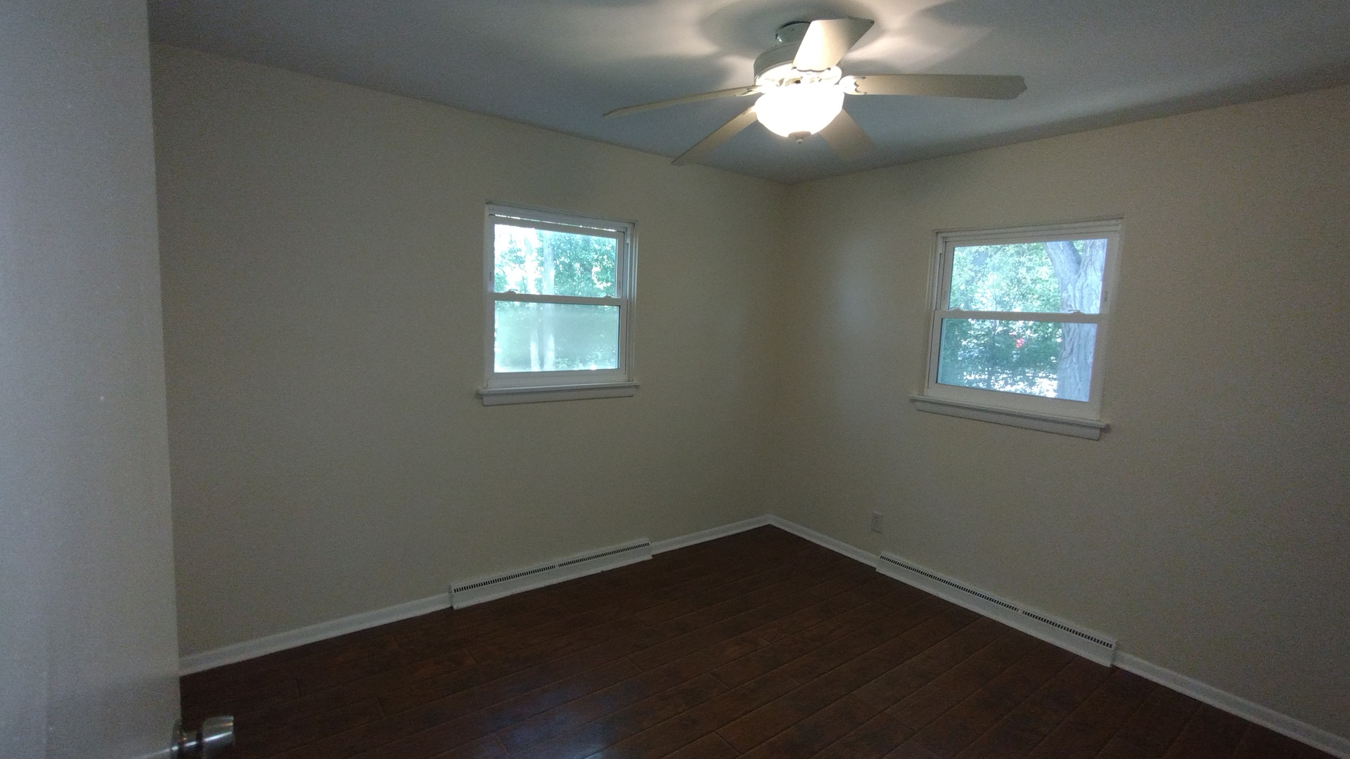 18315 Argyle Avenue Homewood, IL 60430 - Photo 12 of 19 a view of an empty room with wooden floor and a window