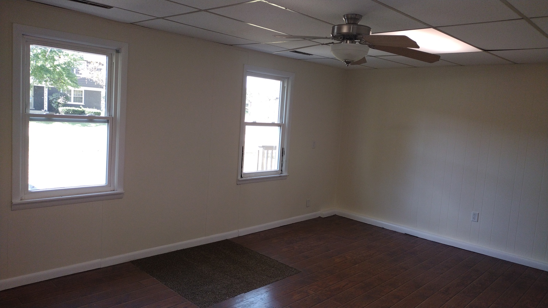 18315 Argyle Avenue Homewood, IL 60430 - Photo 7 of 19 an empty room with a window and a fan