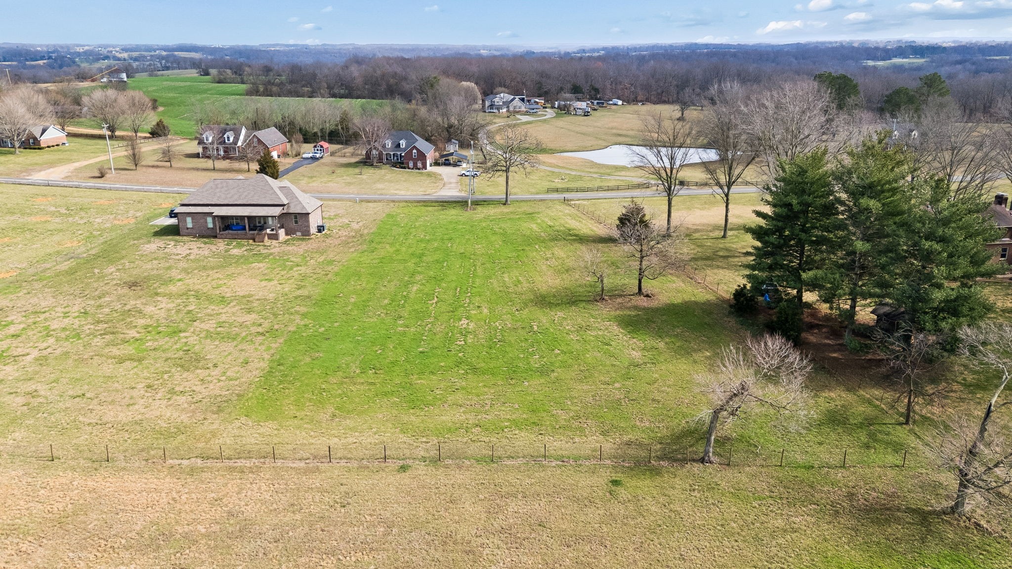 760 North Russell Street Portland, TN 37148 - Photo 11 of 13 a swimming pool with trees in the background