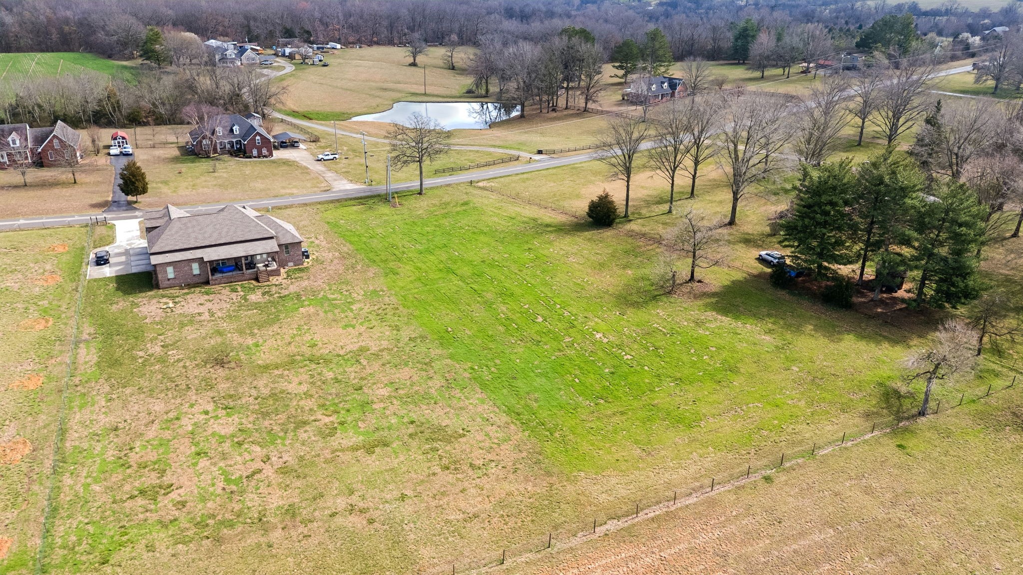760 North Russell Street Portland, TN 37148 - Photo 10 of 13 a swimming pool with some tall trees