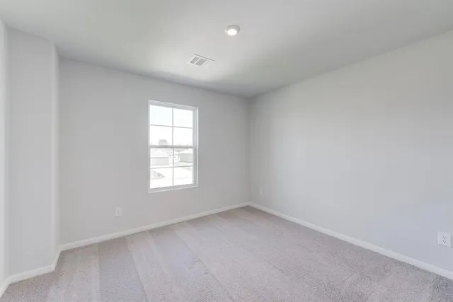 an empty room with window