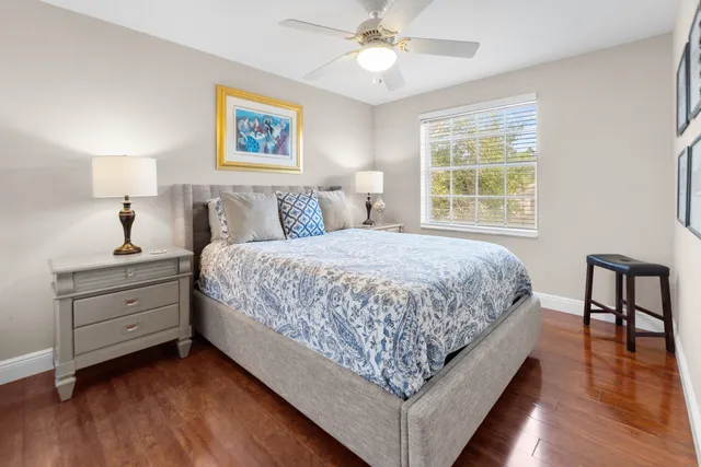 a bed room with a bed and a window