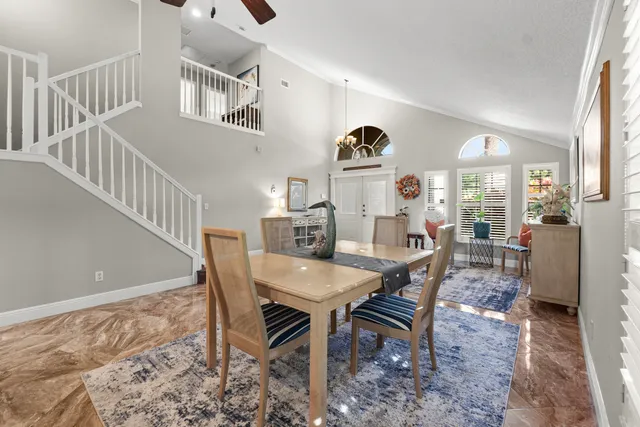 a view of a livingroom with furniture window and wooden floor