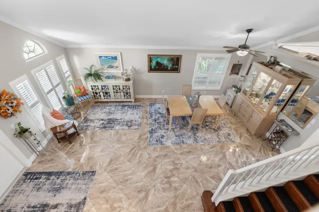 a living room with furniture and a table