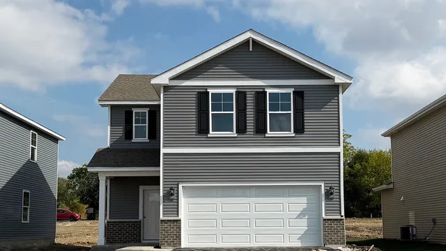 a front view of a house with a balcony