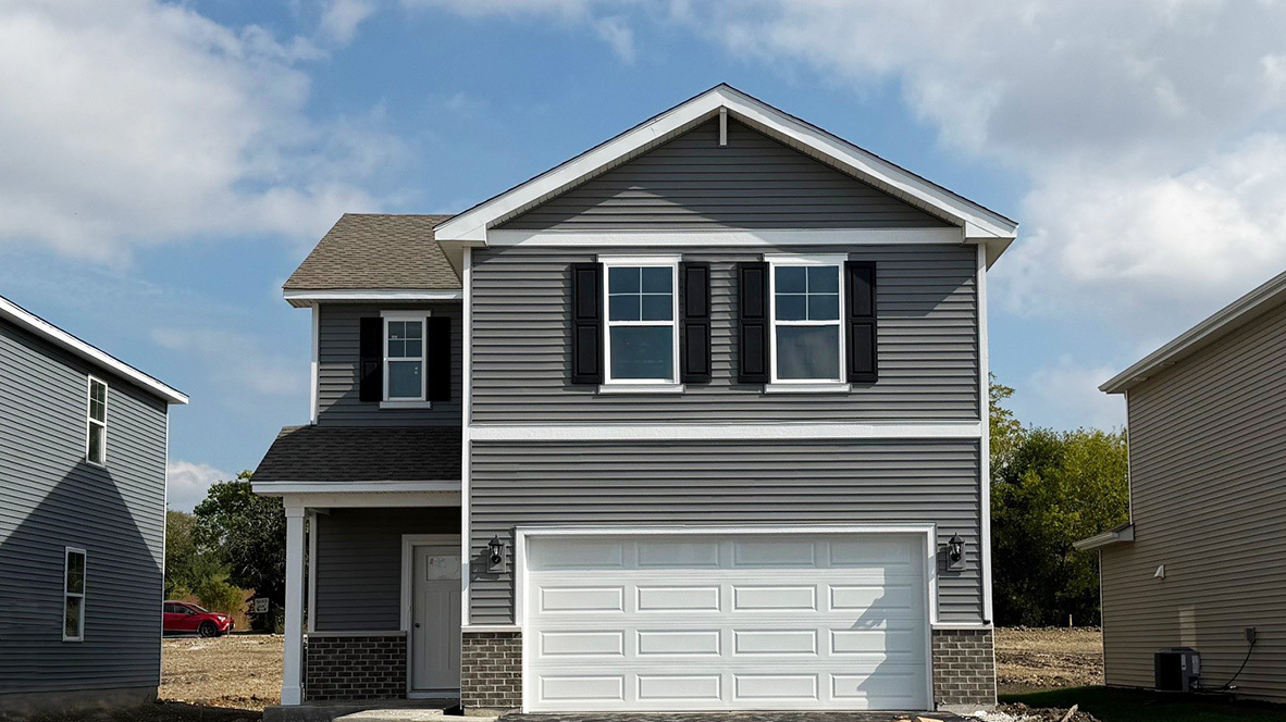a front view of a house with a balcony