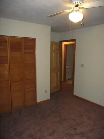 a kitchen with cabinets and appliances
