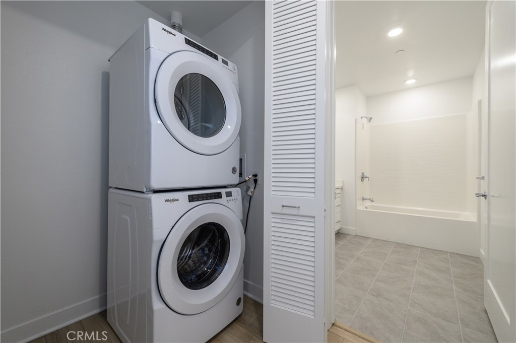 3608 Rivington Irvine, CA 92612 - Photo 39 of 74 a view of a hallway with washer and dryer