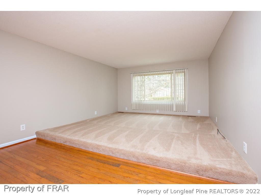 426 Hallmark Road Fayetteville, NC 28303 - Photo 17 of 36 a view of empty room with wooden floor