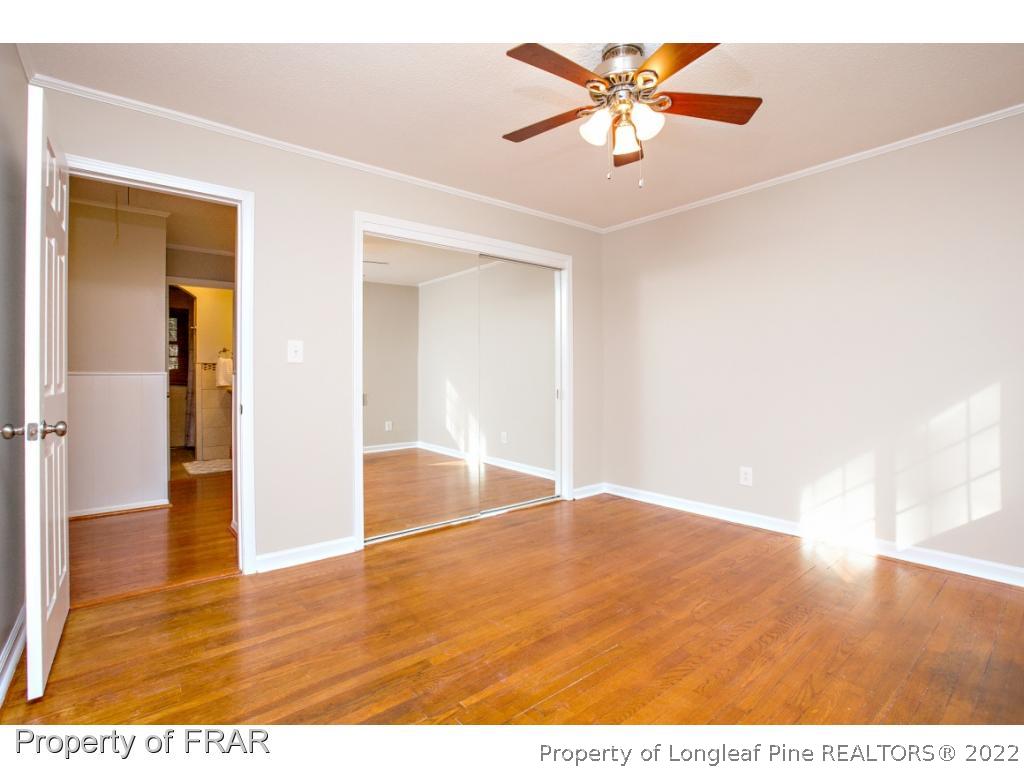 426 Hallmark Road Fayetteville, NC 28303 - Photo 21 of 36 a view of an empty room and window with a kitchen space