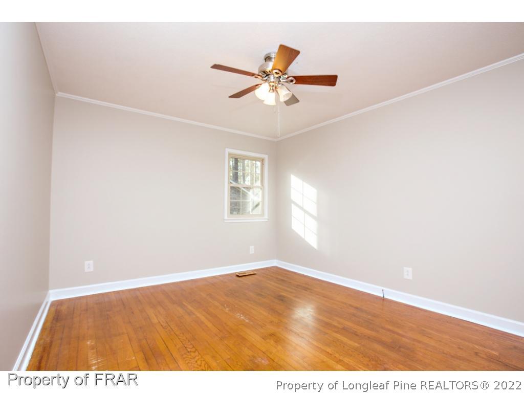 426 Hallmark Road Fayetteville, NC 28303 - Photo 23 of 36 a view of empty room with wooden floor