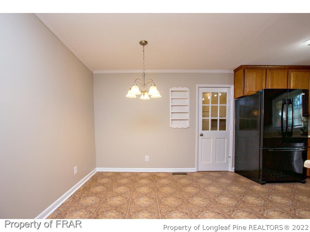 426 Hallmark Road Fayetteville, NC 28303 - Photo 10 of 36 a view interior of a house with a window