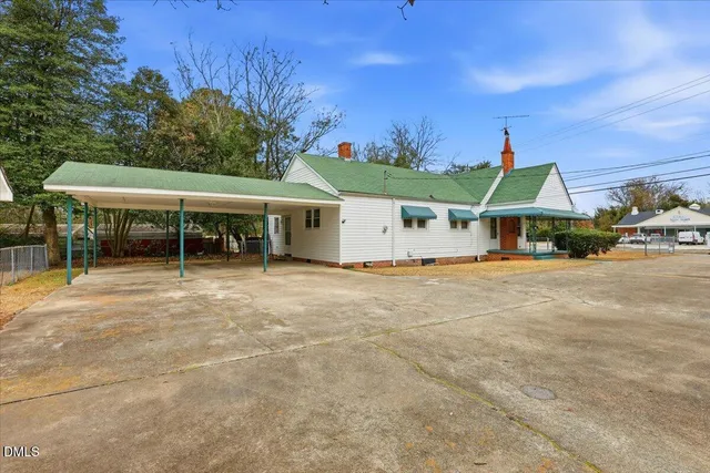 an aerial view of a house with a mountain view