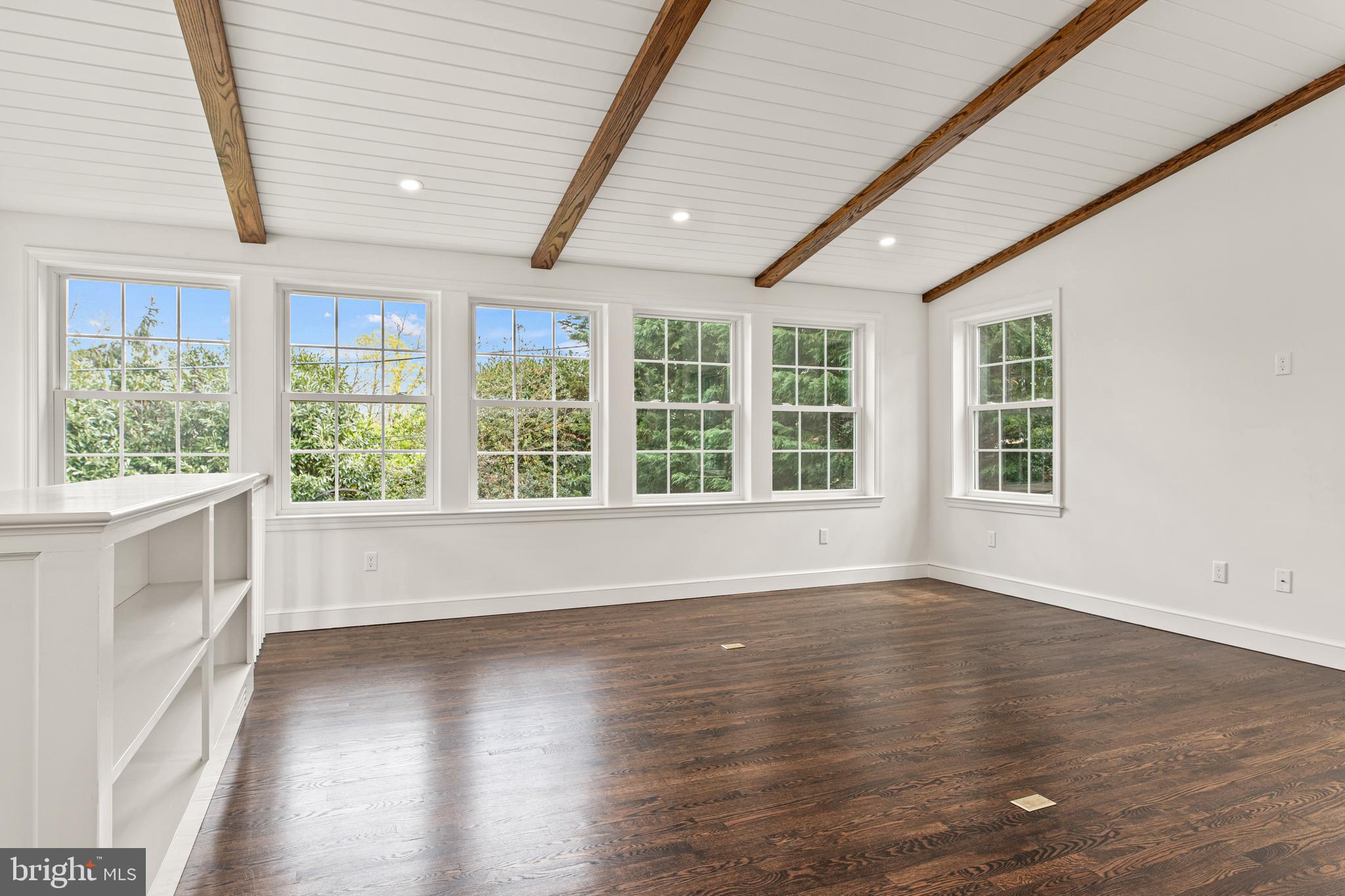 1 Marlyn Circle Wayne, PA 19087 - Photo 13 of 33 a view of an empty room with wooden floor and a window