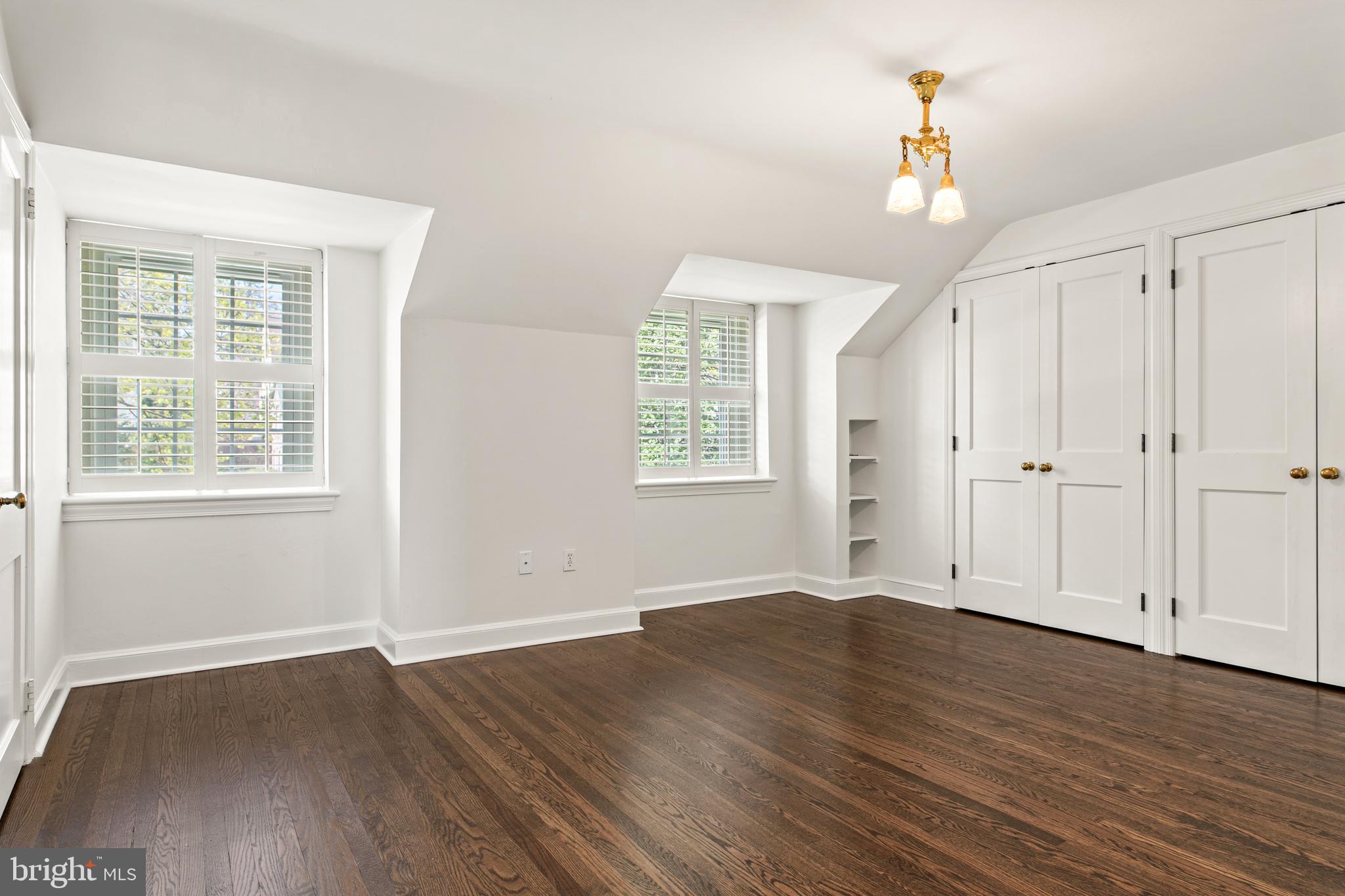 1 Marlyn Circle Wayne, PA 19087 - Photo 20 of 33 an empty room with wooden floor and windows