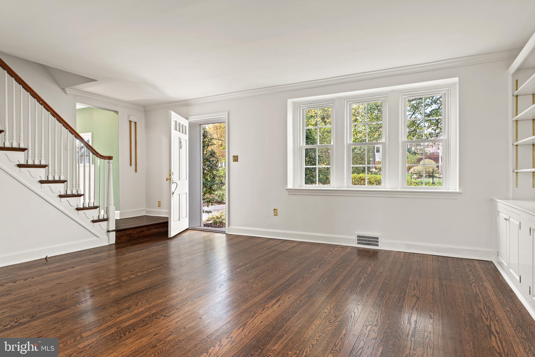 1 Marlyn Circle Wayne, PA 19087 - Photo 4 of 33 a view of an empty room with wooden floor and a window