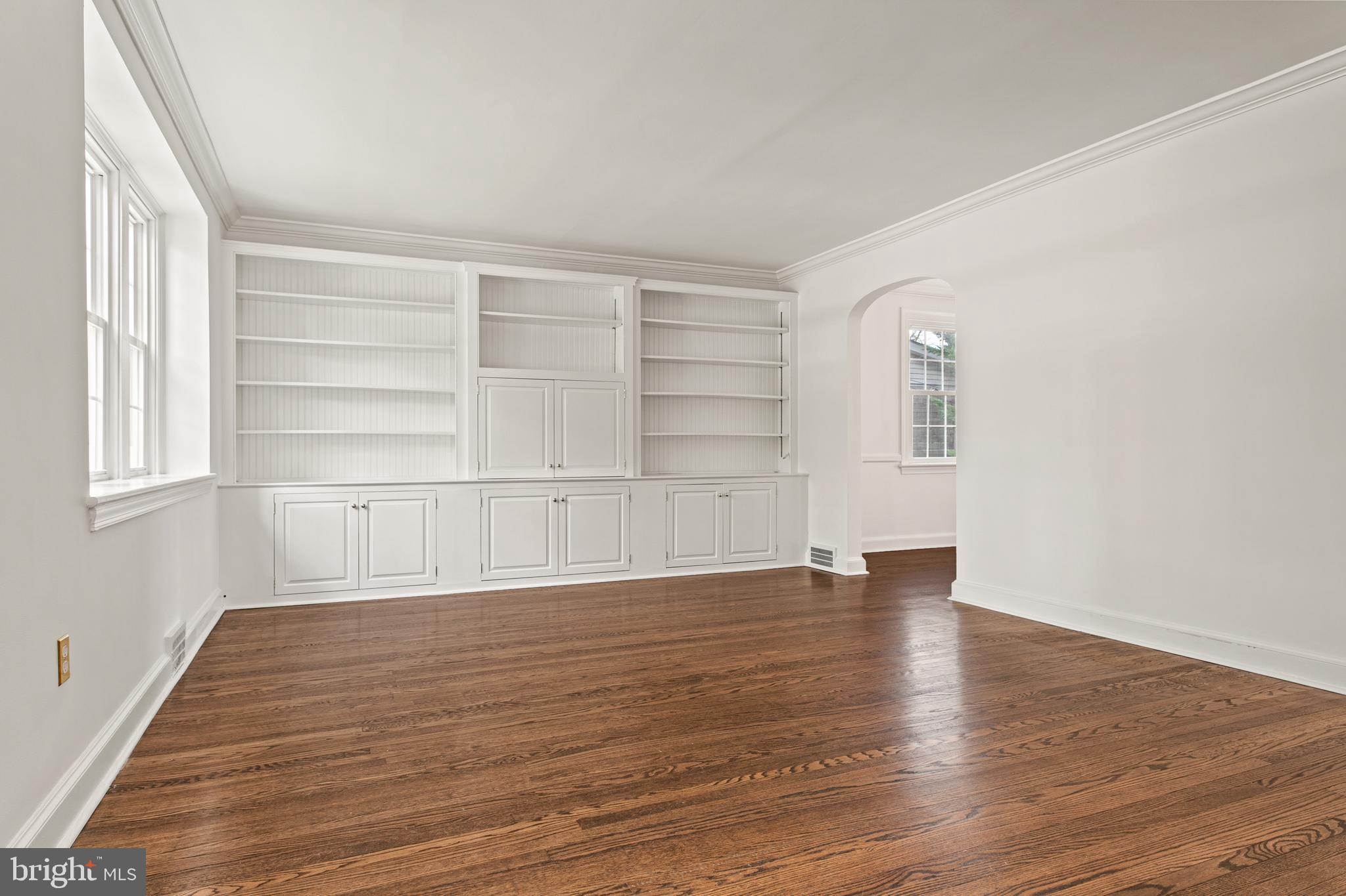 1 Marlyn Circle Wayne, PA 19087 - Photo 7 of 33 a view of an empty room with a window and wooden floor