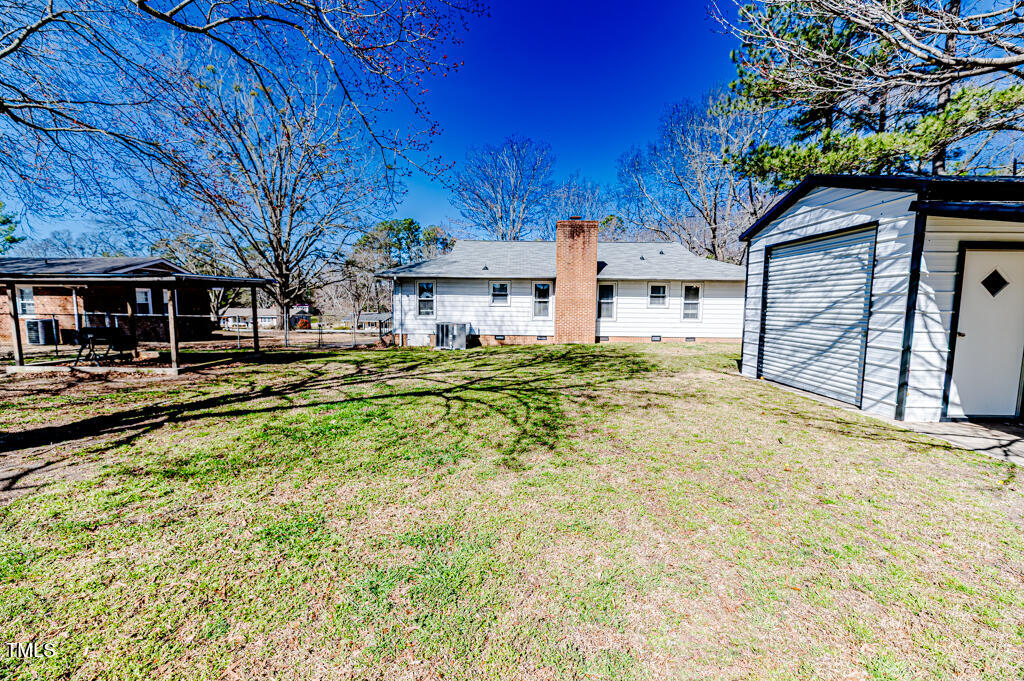 117 Johnson Street Broadway, NC 27505 - Photo 23 of 29 a house view with a outdoor space