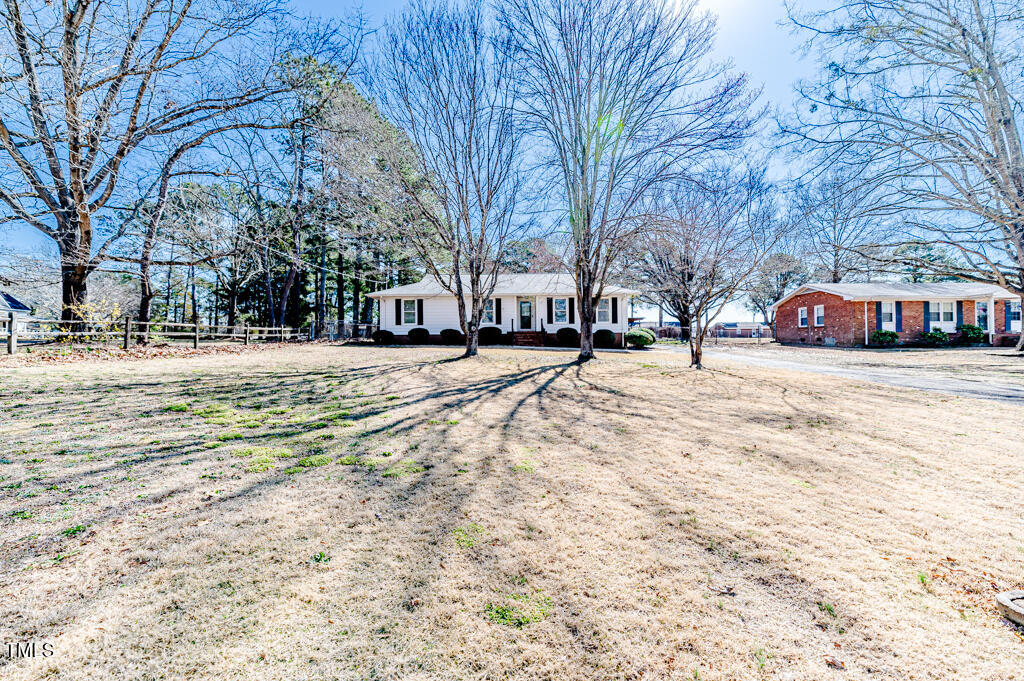 117 Johnson Street Broadway, NC 27505 - Photo 28 of 29 a view of a road with a building in the background