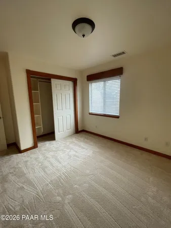 a bathroom with a sink a toilet and a shower