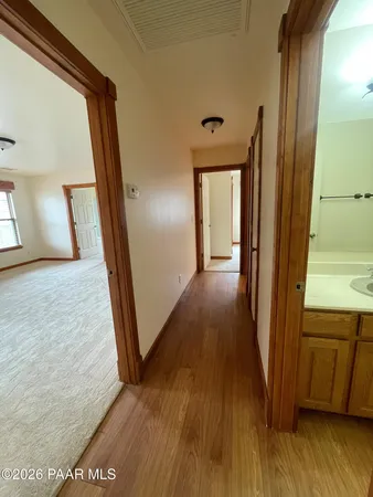 a bathroom with a sink and vanity