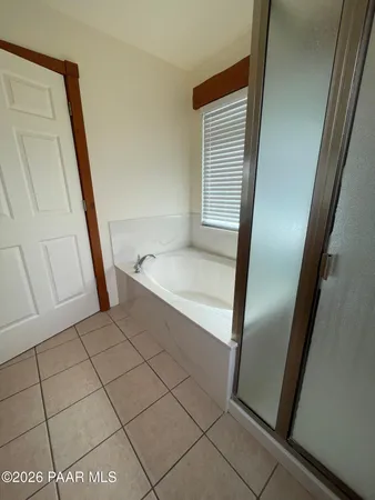 a bathroom with a sink a vanity and a mirror