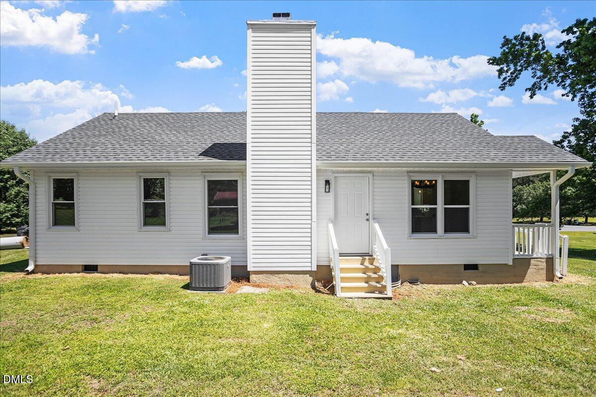 31 Fieldview Court Angier, NC 27501 - Photo 24 of 25 a house view with a garden space