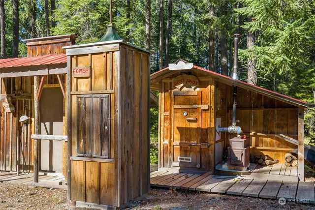 a front view of a house with a glass door and glass windows