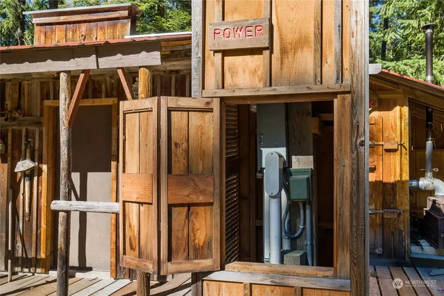 a view of a green field with lots of bushes