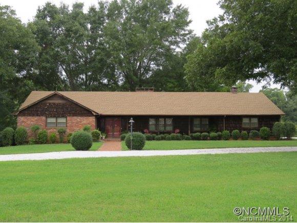 718 Union Road Rutherfordton, NC 28139 - Photo 1 of 24 a front view of a house with garden